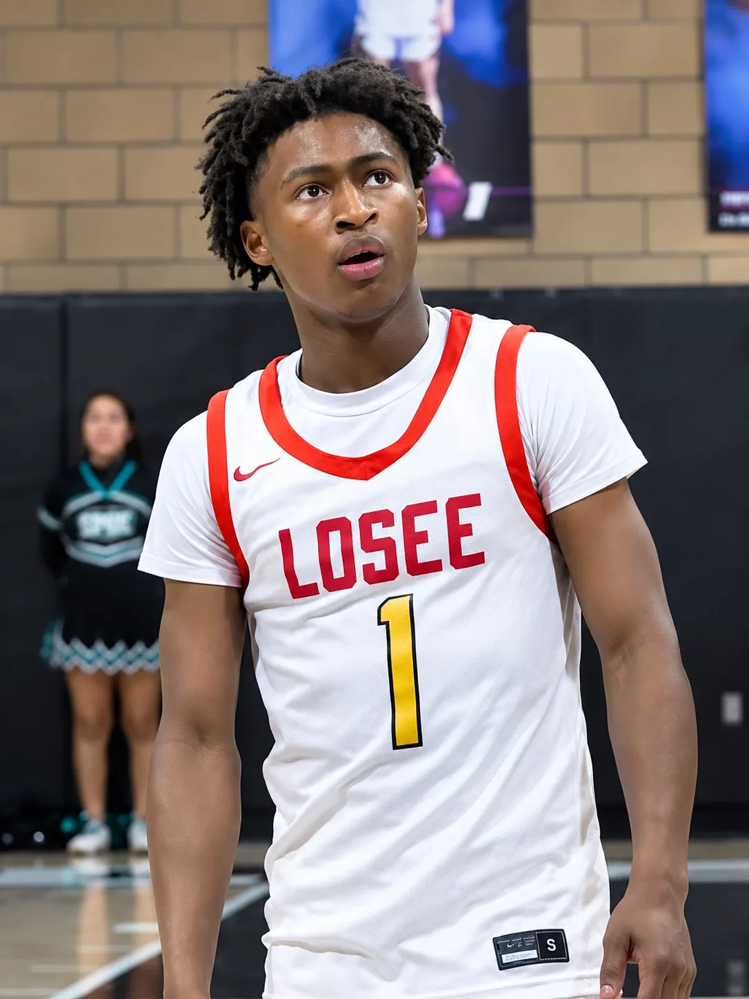 Portrait of DJ Hunter in his white and red jersey